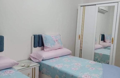 Al-Hamul Apartment | Comfortable Two-Bedroom Apartment with Pool and Family Amenities