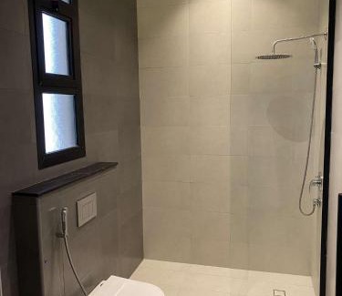 Riyadh Apartment | Modern Apartment in Al Arid with Pool & Family-Friendly Vibe