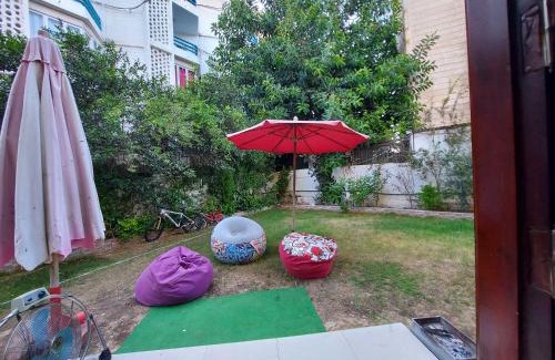 Al-Muntazah Apartment | Cozy Mamora Beach Apartment with Private Garden & Ocean View