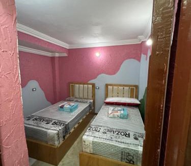 Mansoura Apartment | Modern Two-Bedroom Apartment with Pool Access