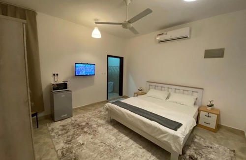 Oman House | Private Room in Muscat: Ideal for Families and Travelers