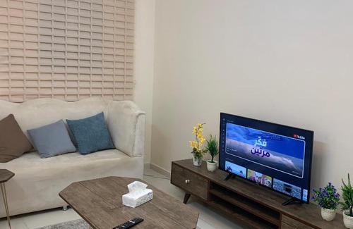 Muhayil Apartment | Comfortable Bedroom and Living Room for Your Family Stay