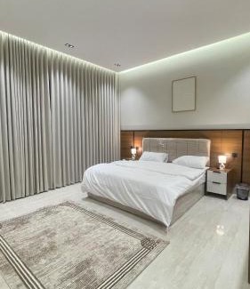 Al Kharj Apartment | غرفة وصالة فندقية في حي الورود