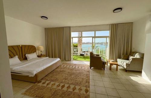 Durrat Al-Arous Ski Chalet | Villa Beta: Private Beachfront Retreat with Pool Access