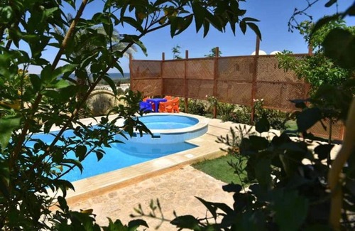 Tunis Village Villa | Experience Rihana Tunis - Fayoum with Pool & Pet-Friendly Features