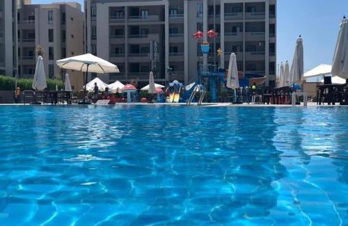 Borg el Arab Apartment | Discover قريه جراند هليز: Ideal for Families with Pets