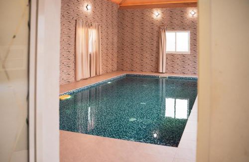 Al Dhaid House | مزرعه غرفتين وخيمه تراثيه ومرافق العاب متنوعه