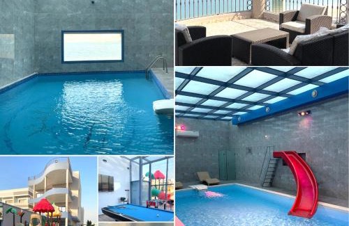 Al Khiran Ski Chalet | Explore Alyal Resort: Oceanfront Luxury with Pool Access