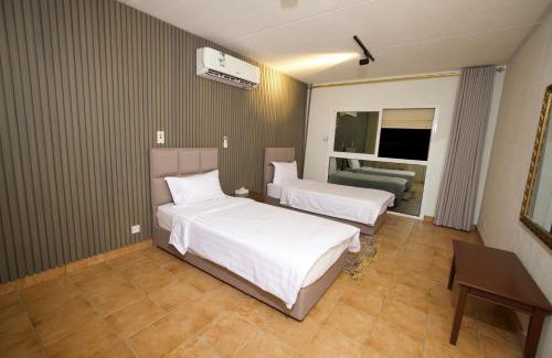 Dhahran Resort | Relax at Palm Beach Resort: Oceanfront & Private Pool Access