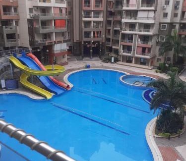 Shurtah al-Dakhlah Apartment | منتجع هوليداى شاطئ النخيل