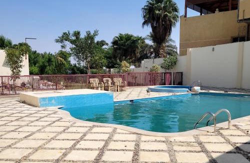 Sinnuris Villa | Moon Light Villa: Oceanfront Retreat with Pool & Hot Tub