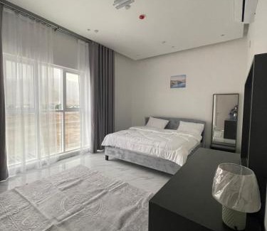 Wadi Bani Kharus Hotel | Relax at Cloudinn: Oceanfront Escape with Pool Access