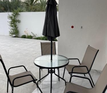 Wadi Bani Kharus Hotel | Relax at Cloudinn: Oceanfront Escape with Pool Access