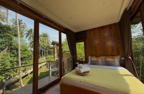 Khanom Villa | Experience Baan Proud Proud: Oceanfront Bliss Awaits