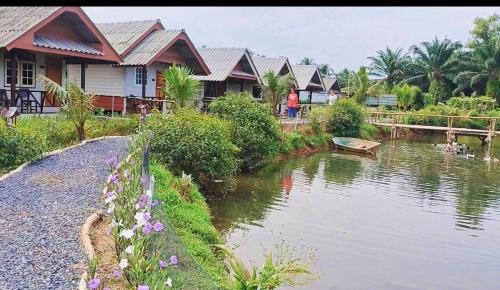 Takua Pa House | Discover ปารมีฟาร์มสเตย์: Family-Friendly Retreat Awaits