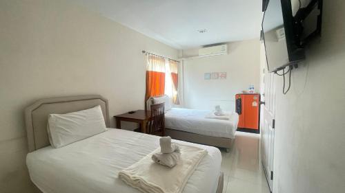Huai Kapi Hotel | Discover K2 Guesthouse: Family-Friendly with Breakfast Included
