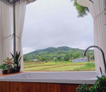 Pua House | Experience Comfort at เฮือนป้อหลวง - Rated 9/10!