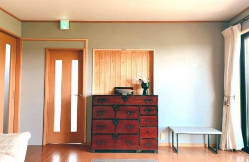 Kirishima House | Relax at OmoyaSai: Cozy Hot Tub & Family-Friendly Retreat
