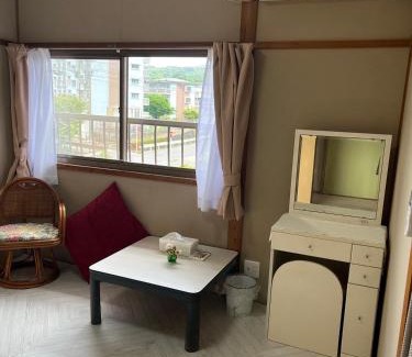 Goto House | Cozy BambooHouse: Fireplaces, Hot Tub & Full Kitchen