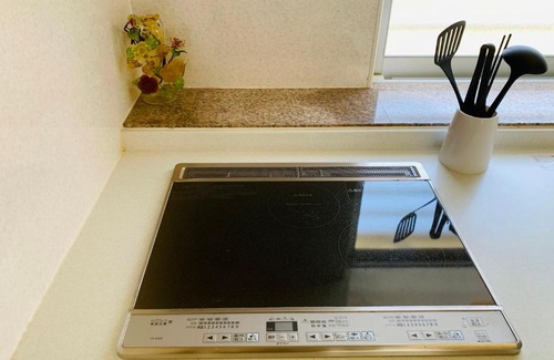 Ginowan Apartment | Family-Friendly ゆくい家 with Kitchen & 9/10 Guest Rating