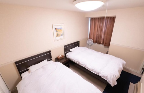 Yuzawa-machi Apartment | Relax at エンゼルリゾート湯沢 616 with Hot Tub & Kitchen