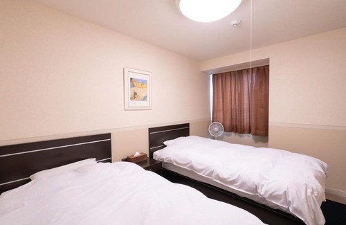 Yuzawa-machi Apartment | Relax at エンゼルリゾート湯沢 616 with Hot Tub & Kitchen