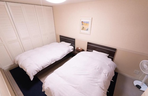 Yuzawa-machi Apartment | Relax at エンゼルリゾート湯沢 616 with Hot Tub & Kitchen