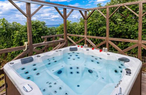 Sakiyama Villa | Family-Friendly Nalu Mele Resort with Inviting Hot Tub