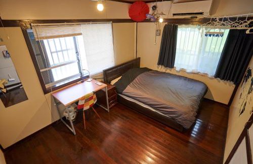 Nakasonecho Apartment | Discover Kaeruhouse: Family-Friendly Stay in Koza