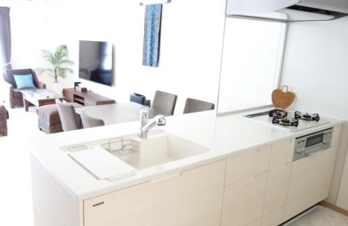 Chatan Villa | Explore Sunline Chatan Condominium Resort with Hot Tub & Breakfast