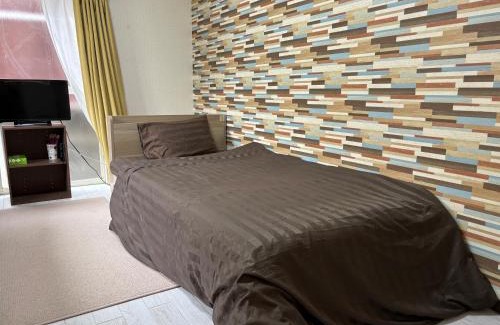 Minami-ku Apartment | Child-Friendly Stay at ザ ミッキー カールトン 井尻