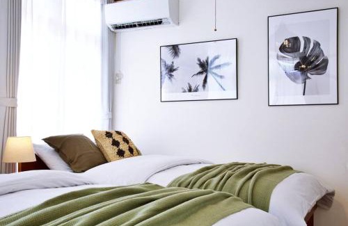 Tsuboya Apartment | Oceanfront Nostalgia: Family-Friendly Retreat Awaits