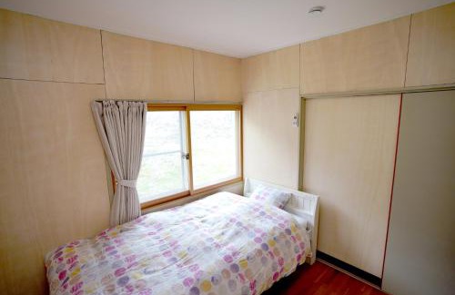 Komoro House | Experience Comfort at ヒュッテ・ボーデン with Hot Tub Access