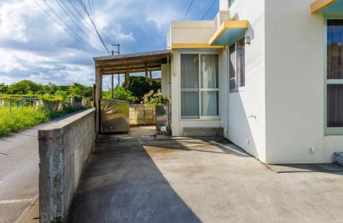 Nago House | Convenient Kanasa Hotel: 5-Minute Walk to the Beach