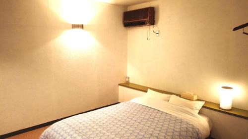 Koshimizu House | Budget-Friendly Hotel Roman: Family Haven with Kitchenette