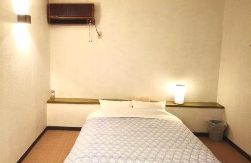 Koshimizu House | Budget-Friendly Hotel Roman: Family Haven with Kitchenette