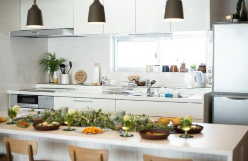 Kadena-cho Villa | Modern Retreat with BBQ Terrace & Free Wi-Fi for 10 Guests