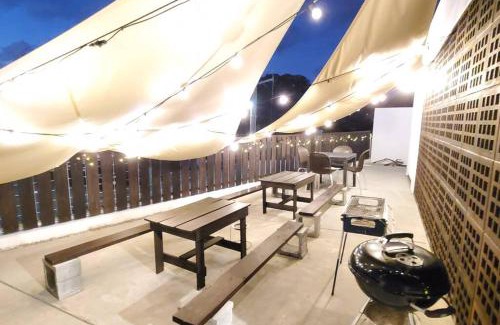 Kadena-cho Villa | Modern Retreat with BBQ Terrace & Free Wi-Fi for 10 Guests