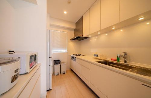 Yohena Apartment | Oceanfront Bliss at ララコートシーサイド屋我地 2D