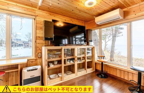 Tobetsu Ski Chalet | Oceanfront Log Cottage with Pet-Friendly Amenities