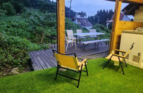 Yuzawa-machi House | Discover Comfort at ロッヂノエル with Hot Tub & Breakfast