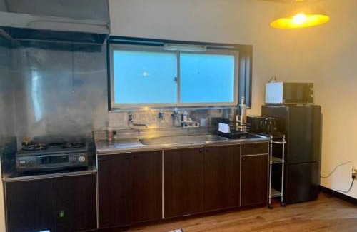 Oirase Keiryu Onsen Apartment | Discover 奥入瀬屋: Family Retreat with Kitchen Access