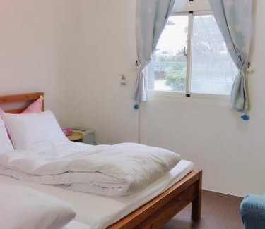 Sanxing House | Enchanting One-of-a-Kind Retreat with Family-Friendly Amenities
