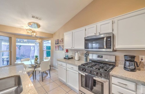 River Mountain House | Discover Sunset Swim: Modern Vegas Retreat with Pool & Spa!