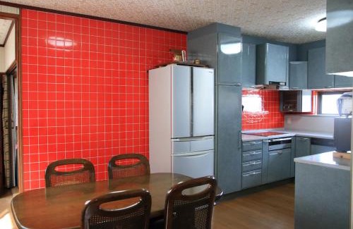 Tsurugi-cho House | Family-Friendly Comfort at 上田屋 半田館 with Kitchen Amenities