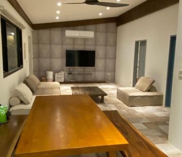 Sanxing Apartment | Relax at Five Sky Homestay with Hot Tub & Kitchen Access