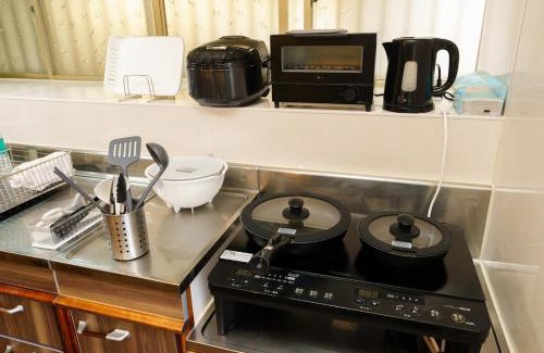 Beppu Villa | Experience Relaxation at 内竈ひなた庵 with Hot Tub Amenities