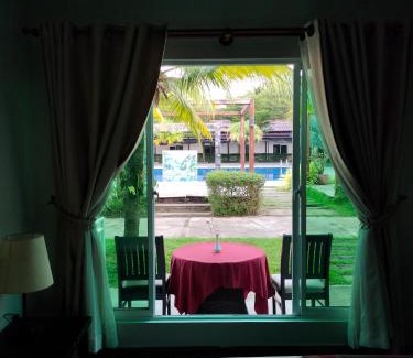 Sihanoukville City Centre Apartment | Discover Dual Palm Resort: Pet-Friendly & Poolside Fun