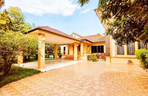 Wua Lai Villa | Elegant Villa with Pool Steps from Night Market & Ta Phae Gate