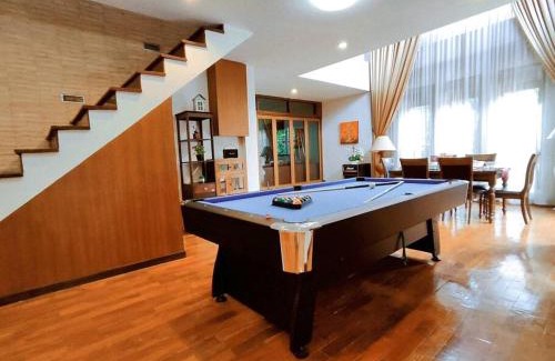 Wua Lai Villa | Elegant Villa with Pool Steps from Night Market & Ta Phae Gate